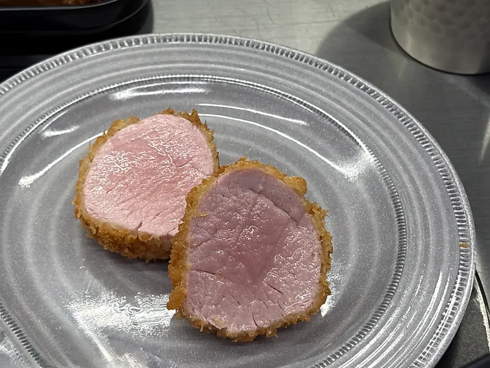 Black pork katsu dipped in sauce