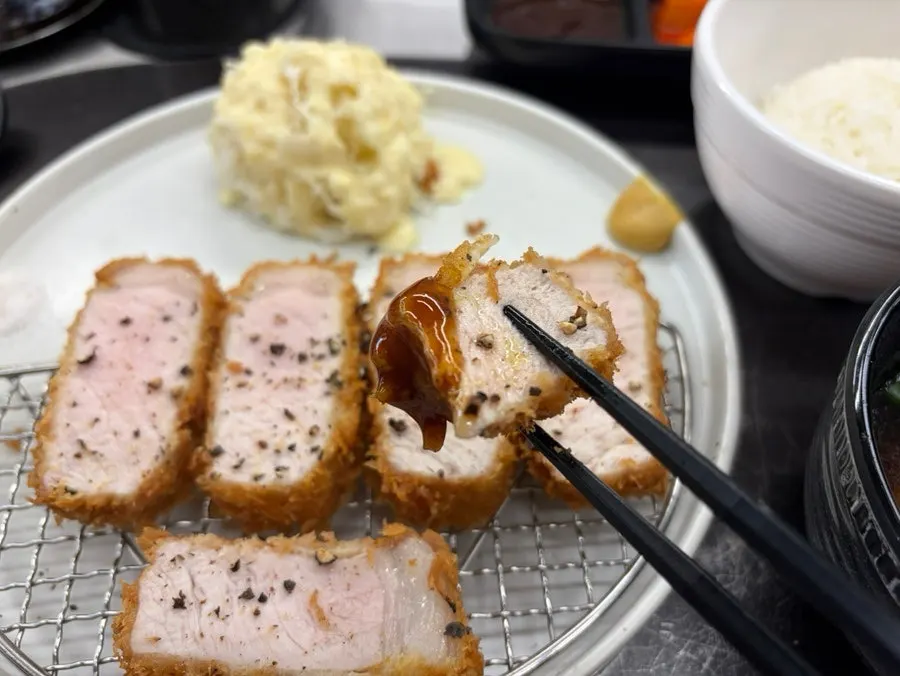 Neatly plated Jeju black pork loin katsu