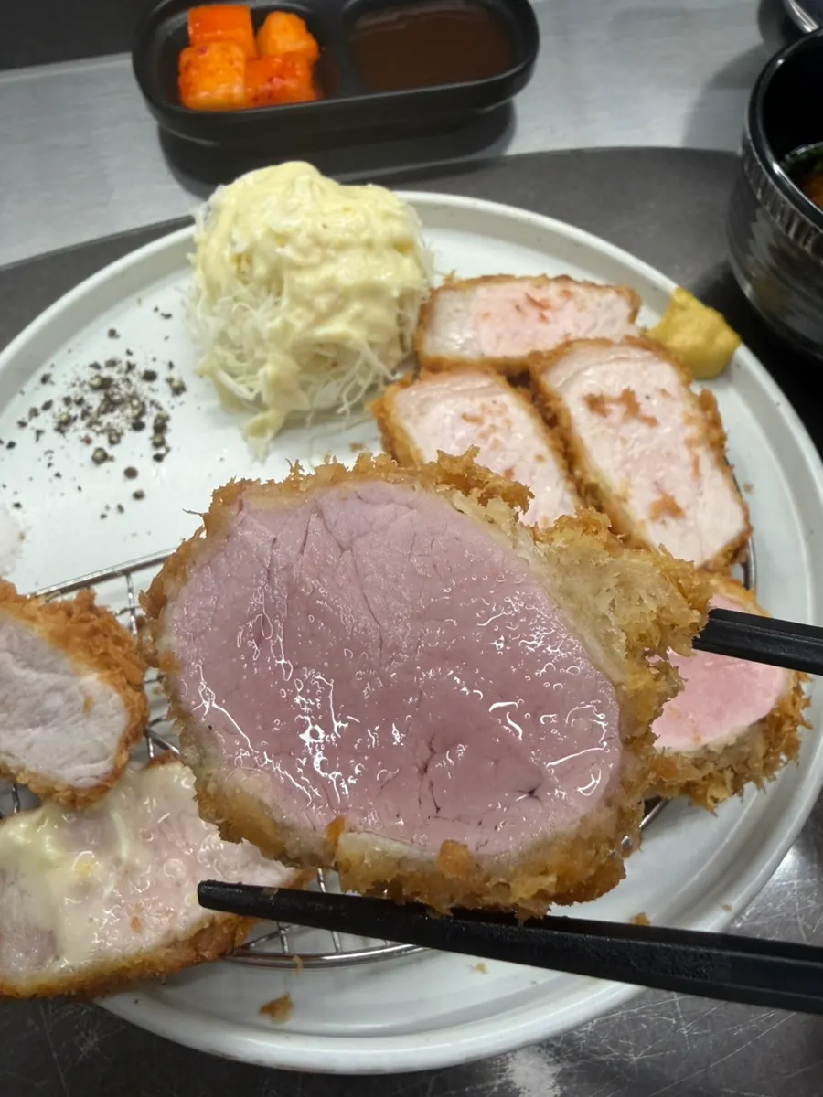 A piece of loin katsu tasted plain, with no condiments