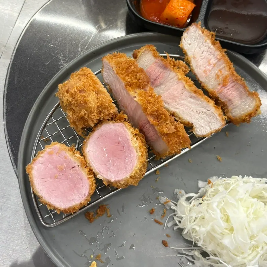 Two plates of tonkatsu