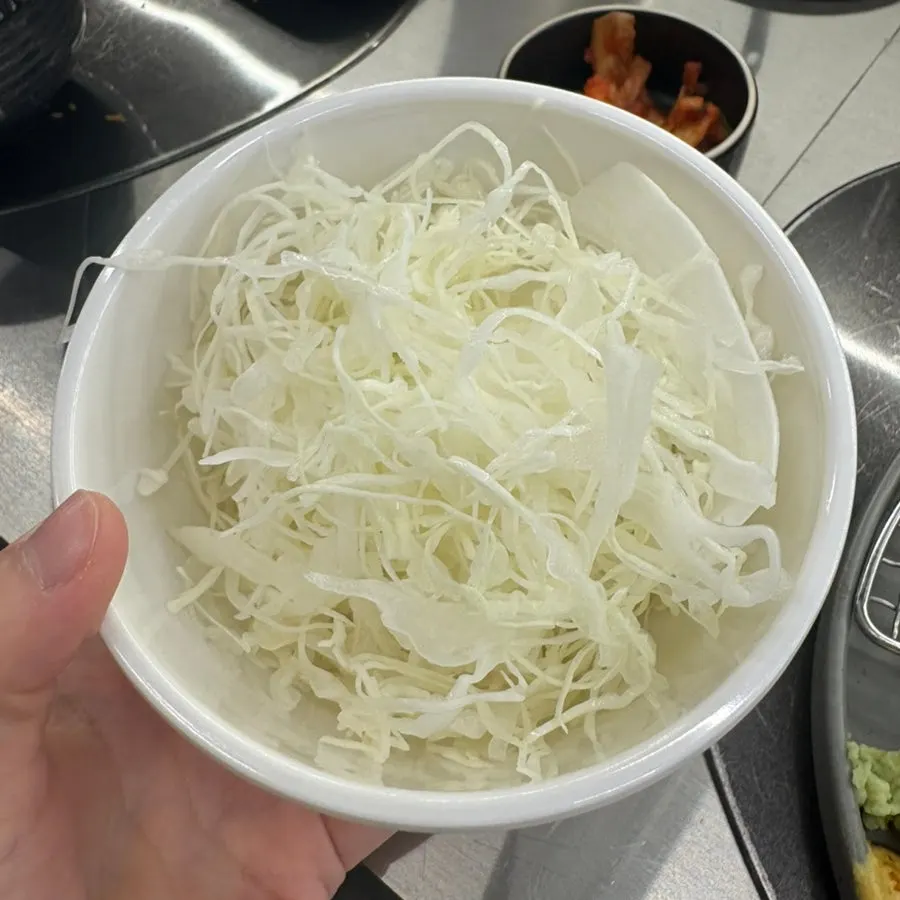 Cabbage salad topped with corn dressing
