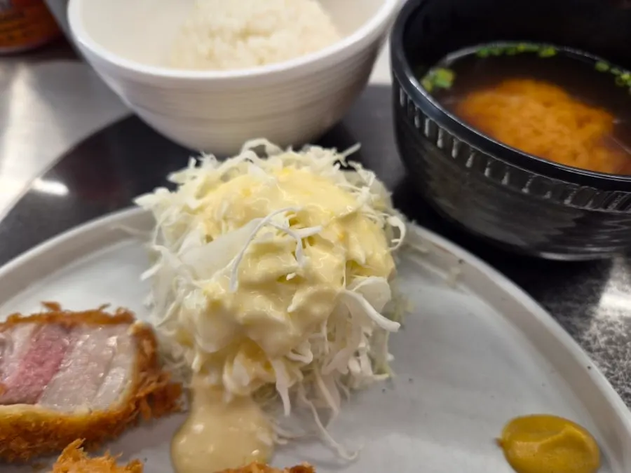Cabbage salad drizzled with corn salad sauce