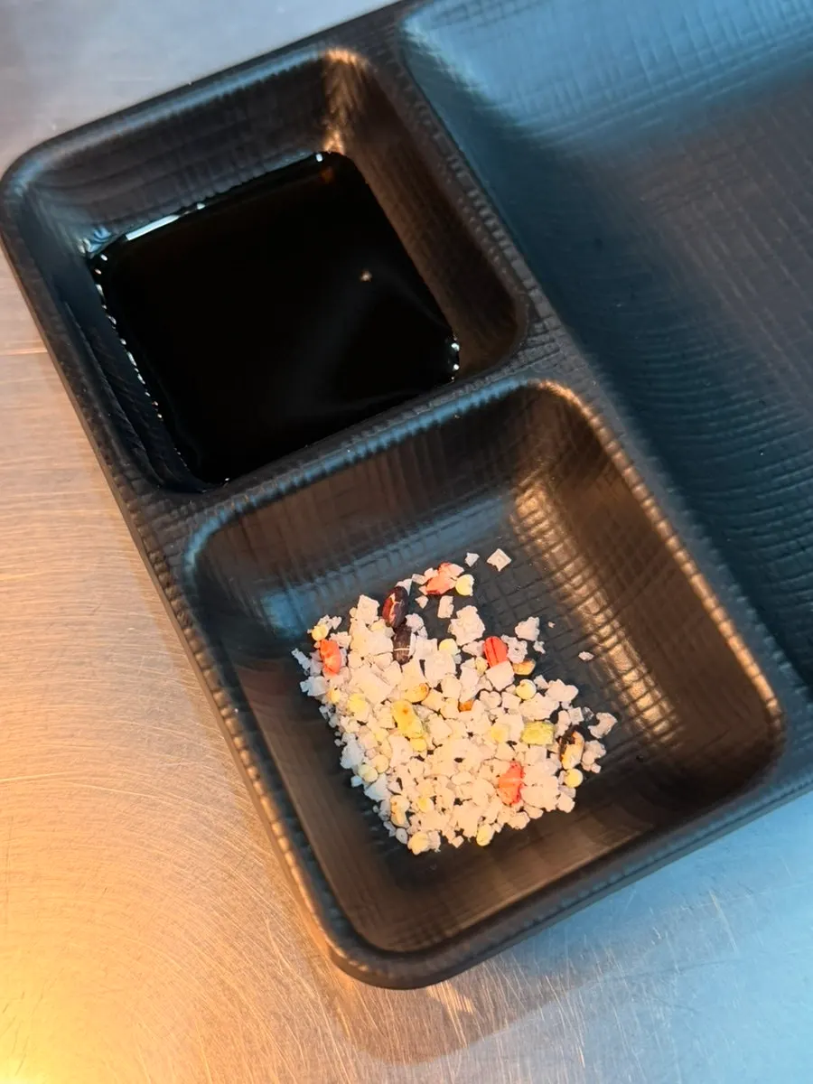 House-roasted rice salt served with scallion shreds