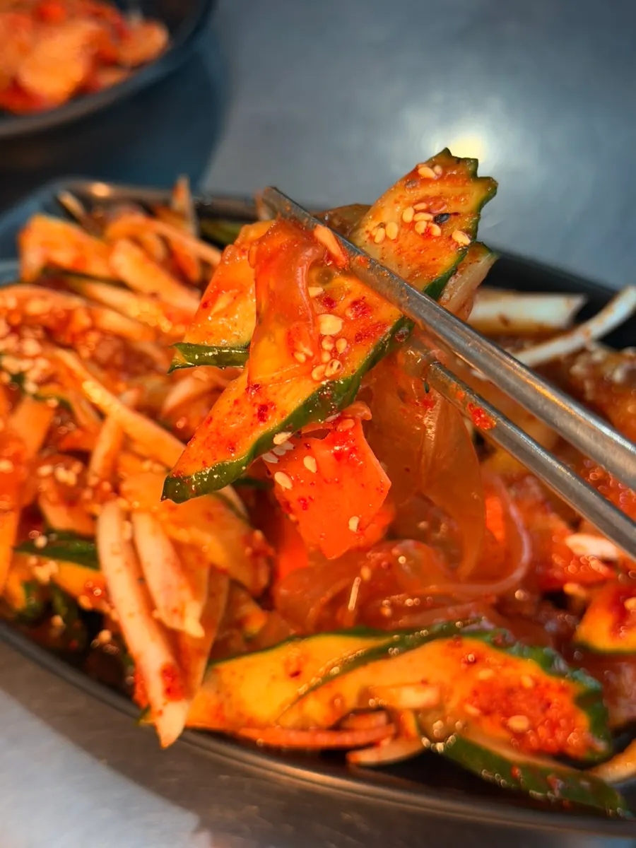 A plate of spicy-tangy glass noodle cucumber salad
