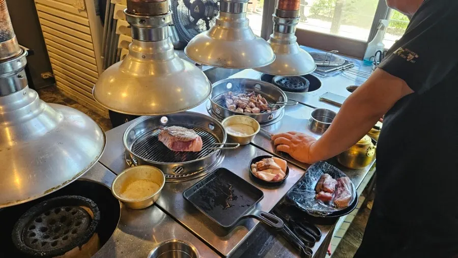 Charcoal grilling in the dedicated grilling space