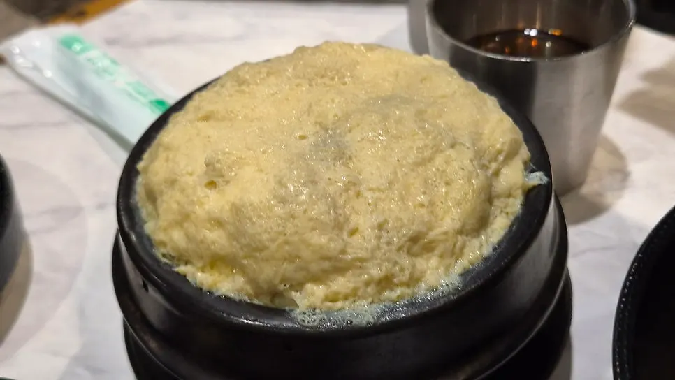 Complimentary steamed egg and mooksabal