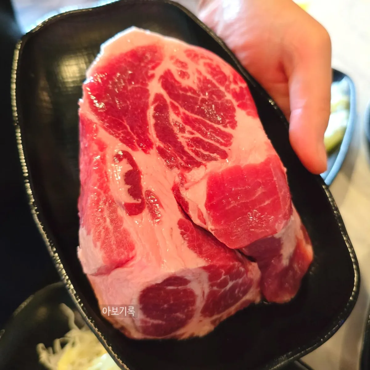 Thick raw Jirisan black pork neck meat