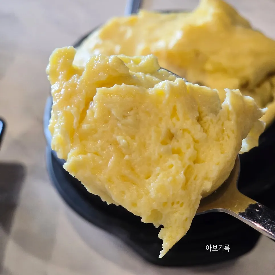 Close-up of the softly puffed-up steamed egg