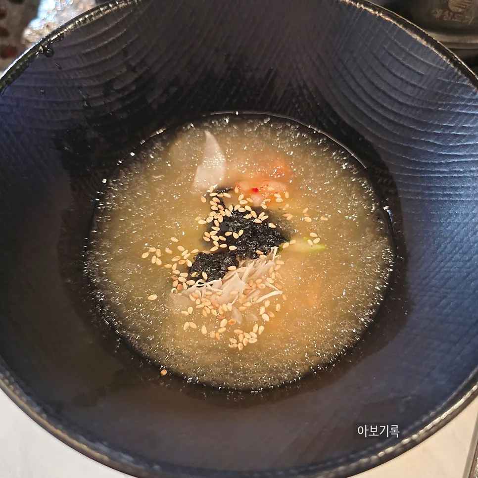 A refreshing bowl of free mukbap (acorn jelly soup)
