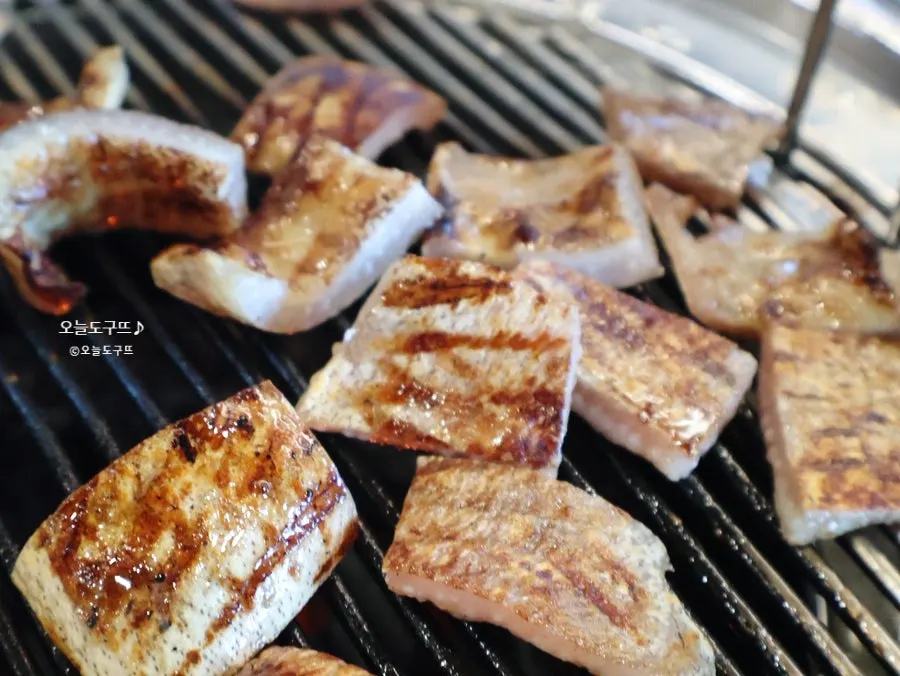 Golden brown grilled raw black pork skin