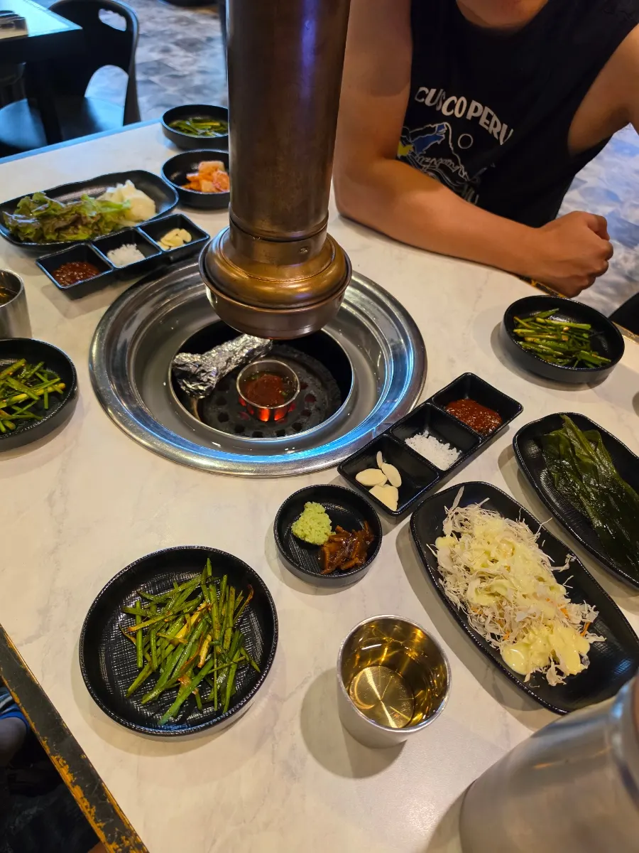 Table set with the charcoal grill