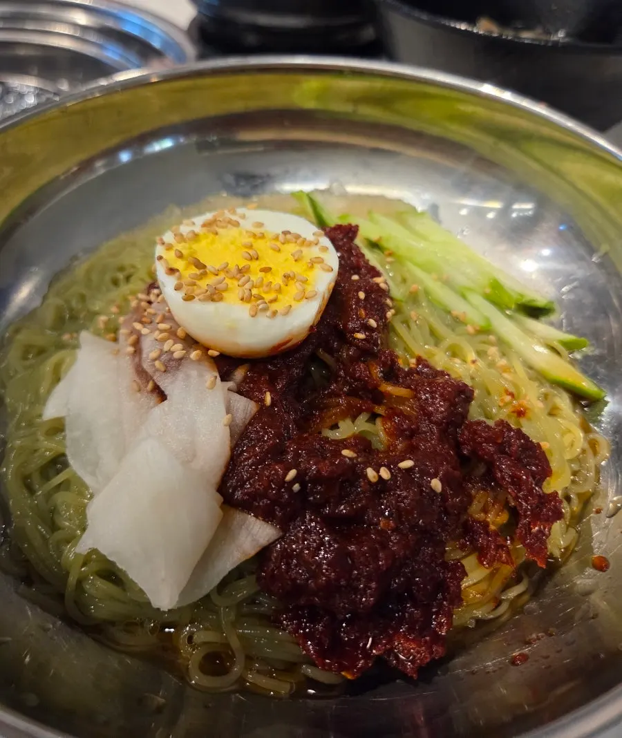 Side menu items including gochujang jjigae and naengmyeon