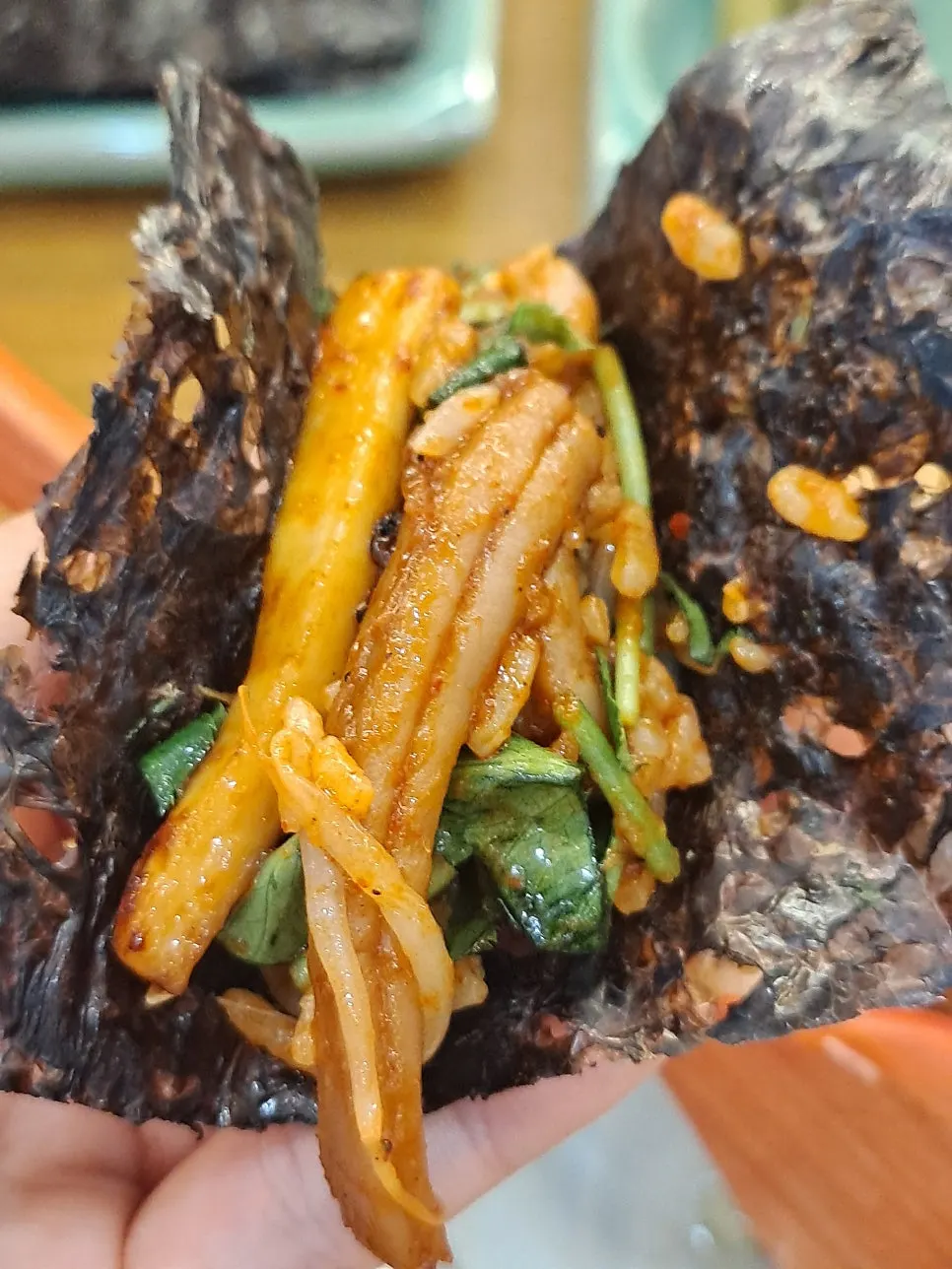 Red-seasoned stir-fried squid with chamnamul herb