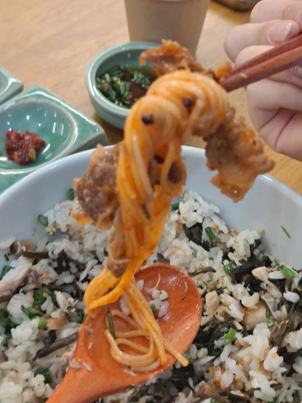 Bibim noodles with meat hidden under the herring roe