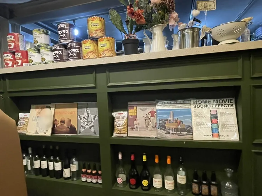 Tables and wall decor at Hey Joji