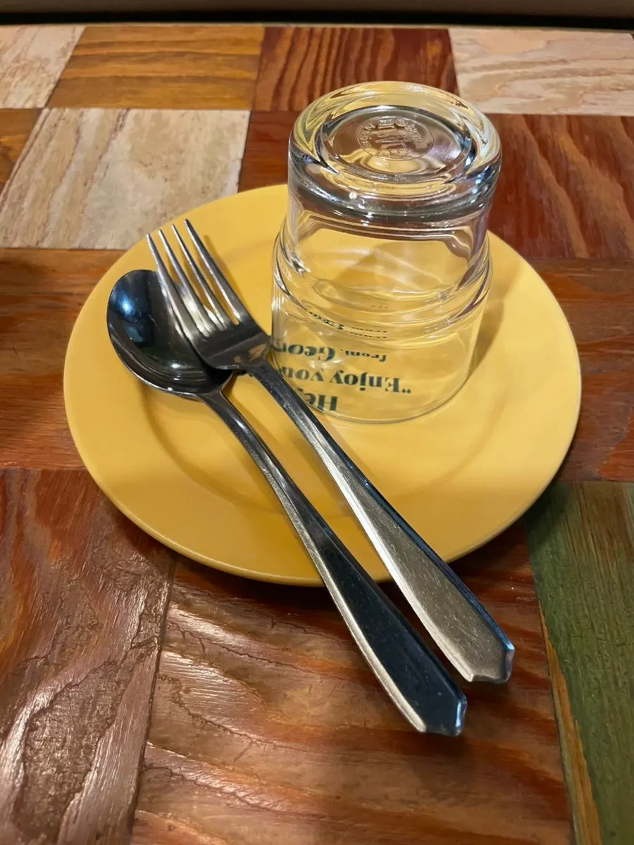 Tableware set on a table at Hey Joji
