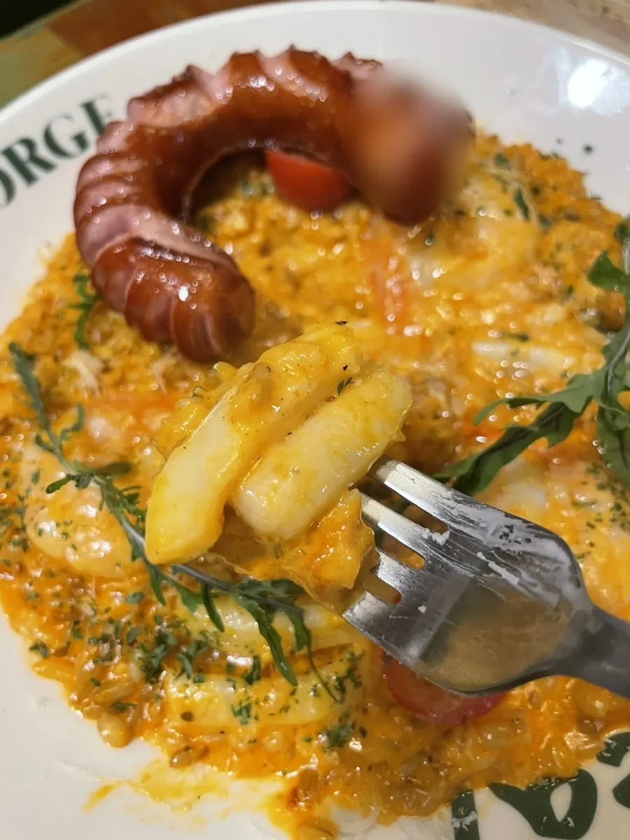 Close-up of jambalaya risotto with squid and shrimp