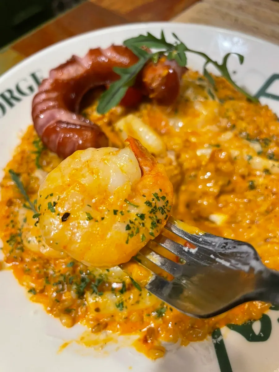 A spoonful of rosé risotto rice
