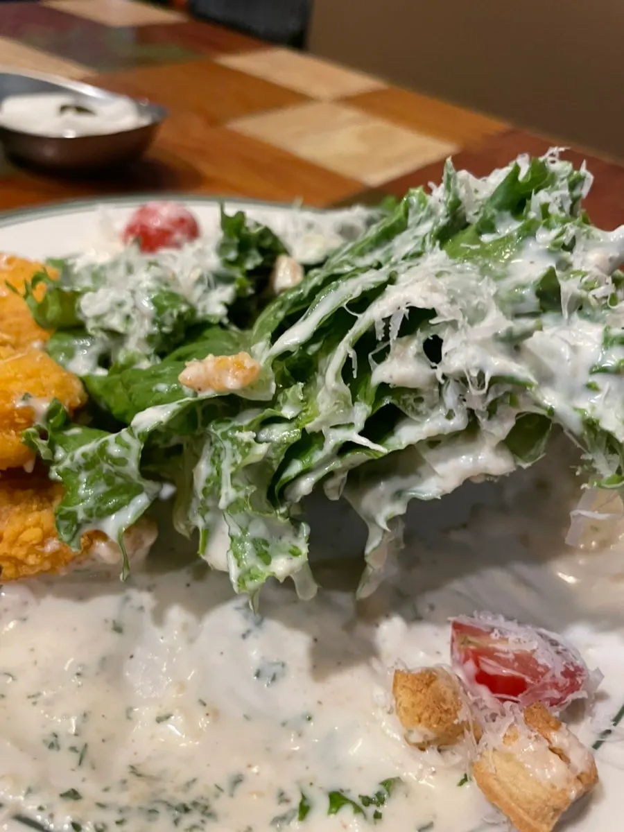 Alternating bites of risotto and salad