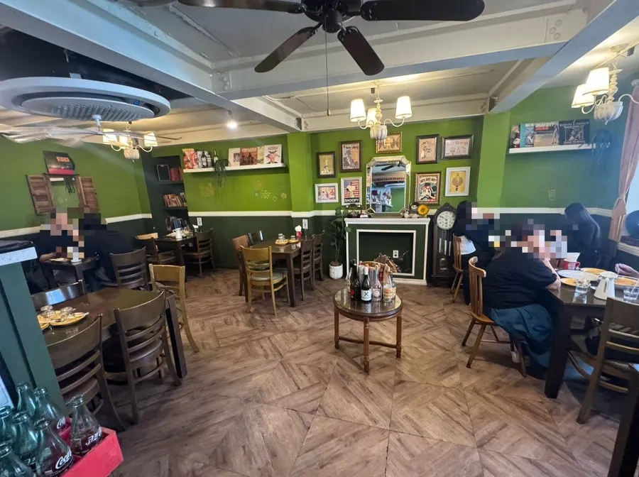 Hey Joji interior with vintage-style lamps