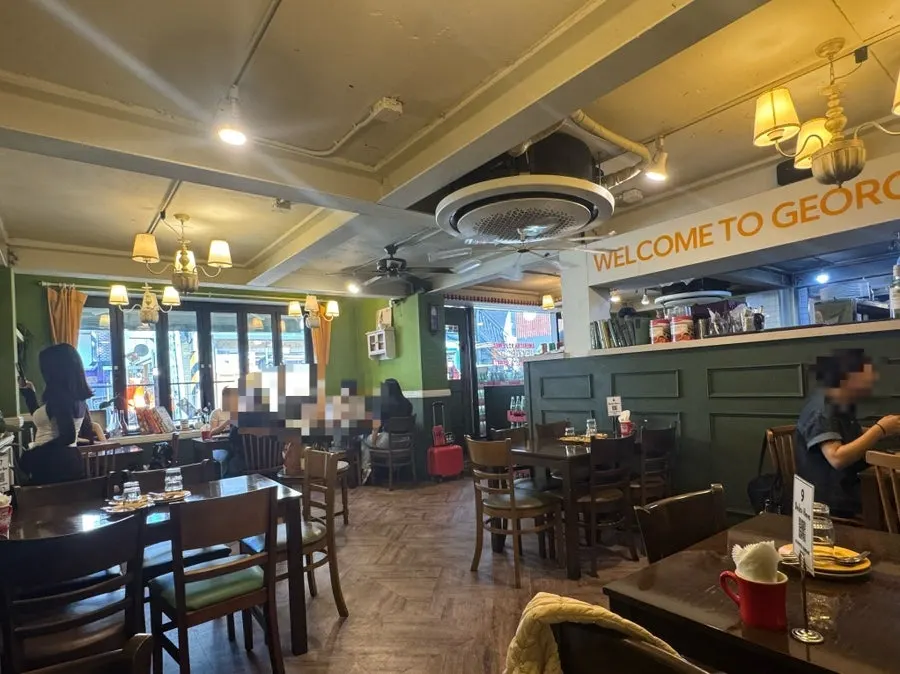Cozy seating area at Hey Joji