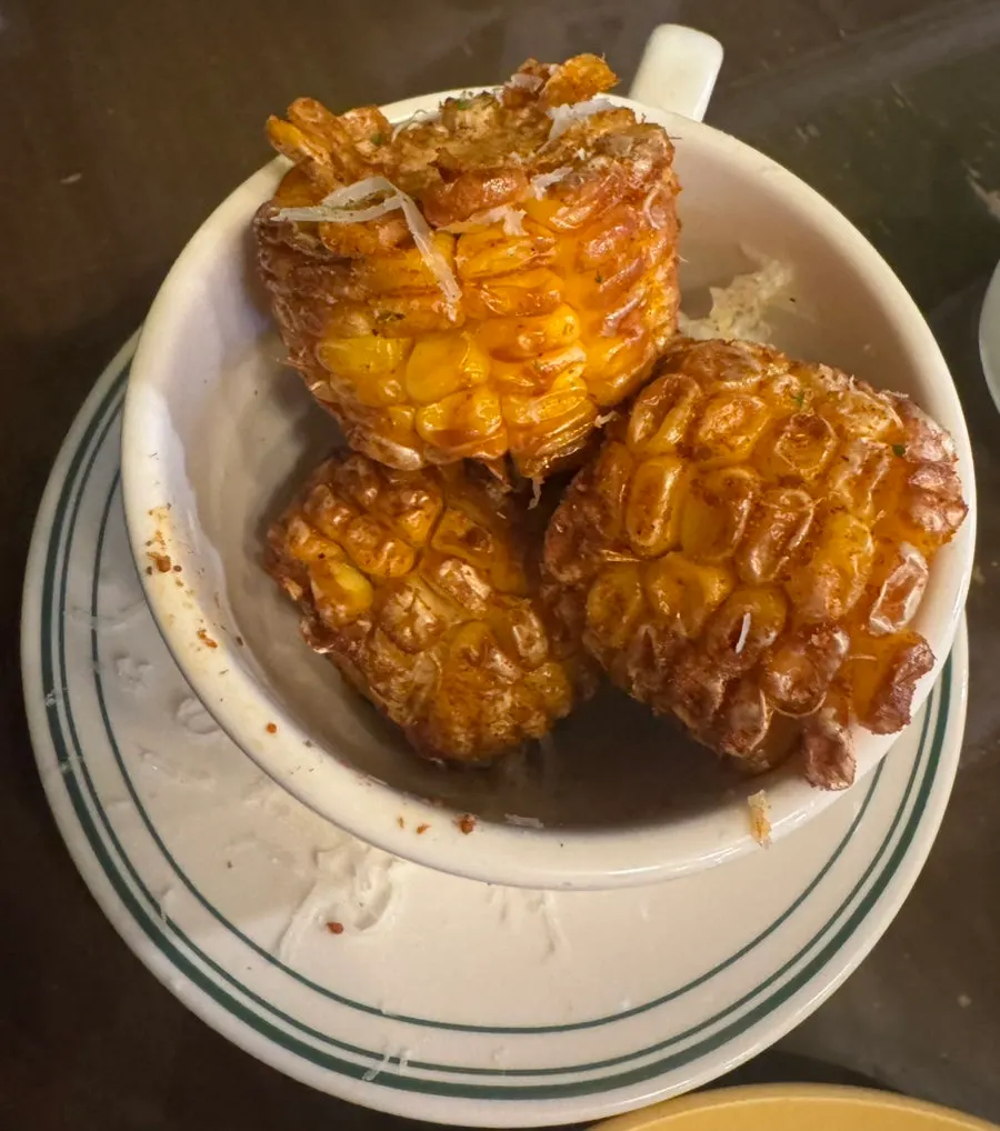 Close-up of Hey Joji's sauce-coated corn ribs