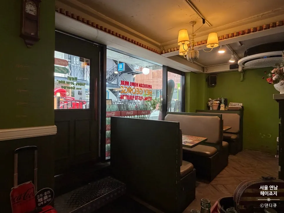 4-person sofa booths on the left side of Hey Joji's entrance