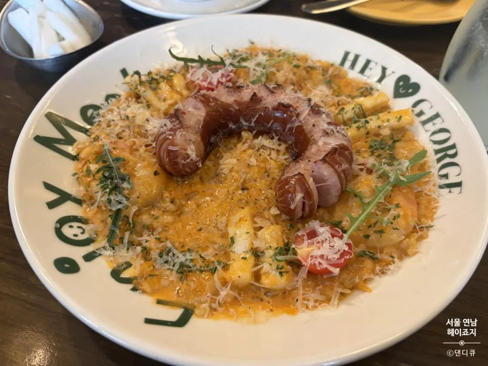 Jambalaya risotto topped with sausage