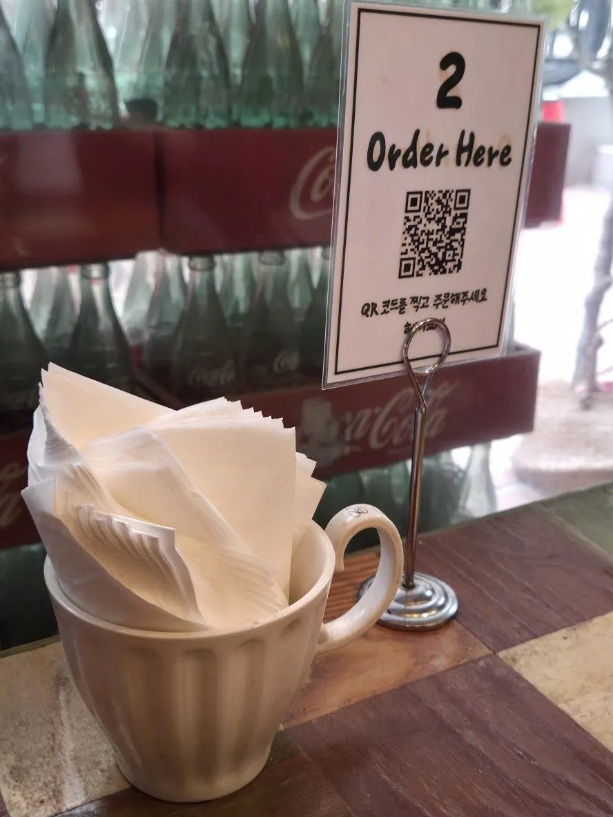 QR ordering instructions at Hey Joji