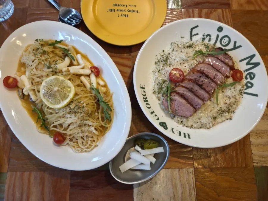 Pasta and risotto placed together on the table