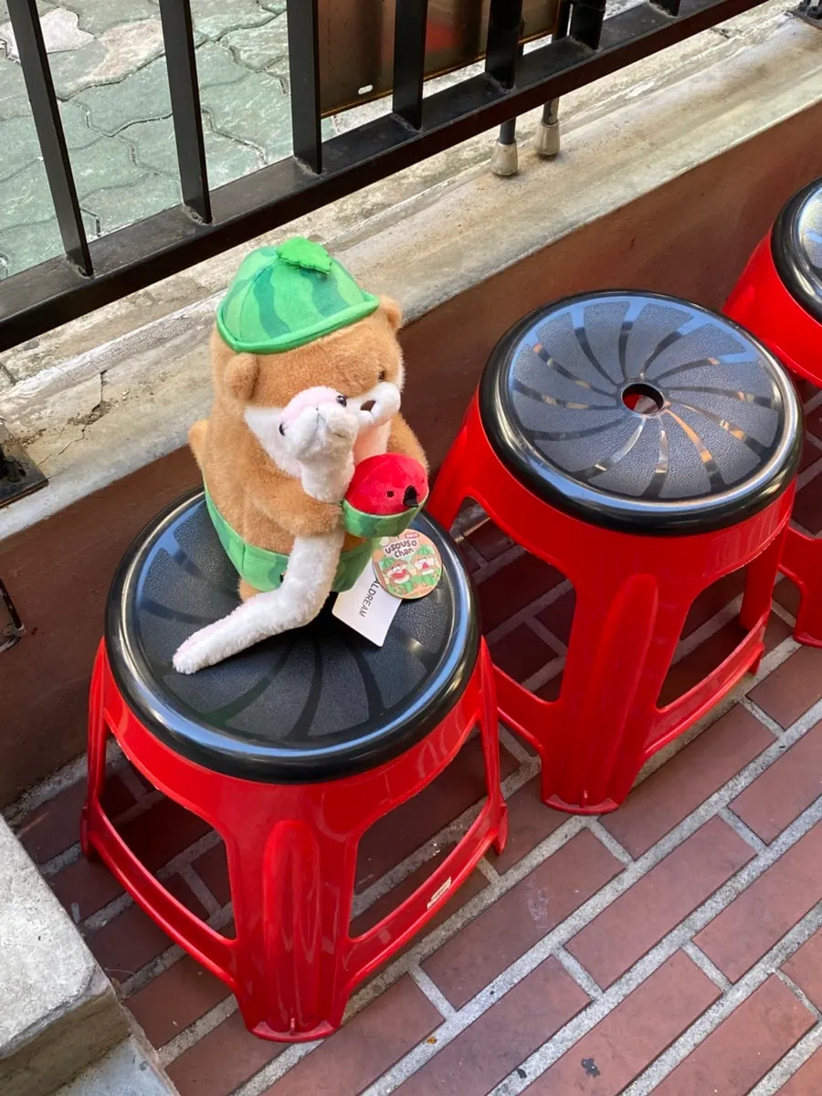 A cute character figure displayed outside the restaurant