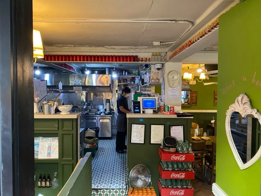 The interior of Hey Joji, featuring a green interior