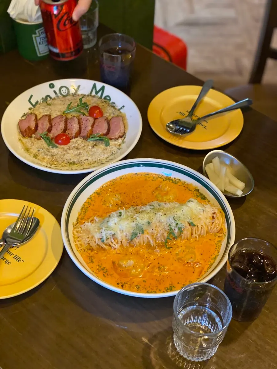Two plates from Hey Joji set on the table