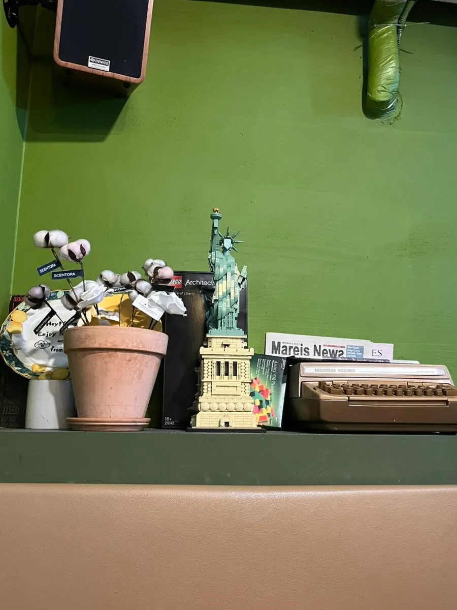 Corner of the restaurant decorated with vintage props on the wall