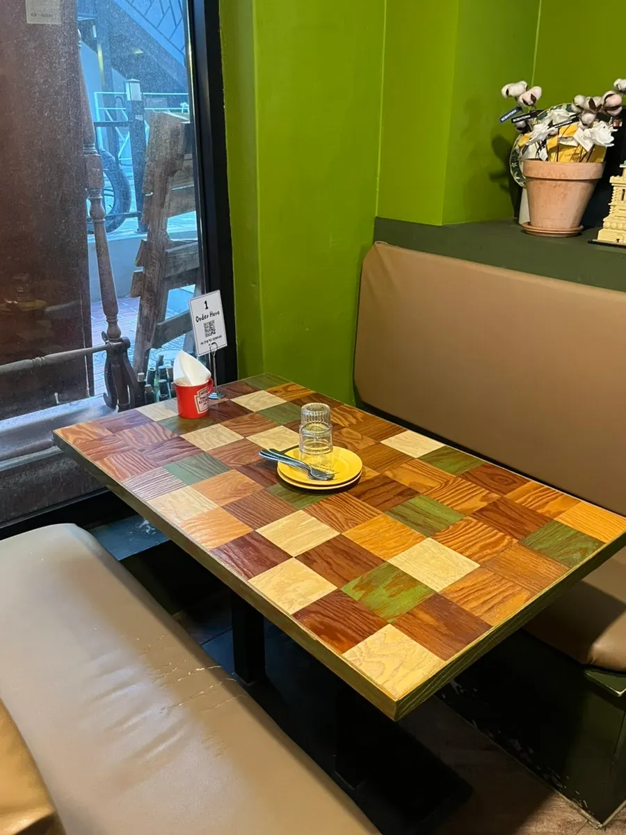 Tables arranged with wide spacing