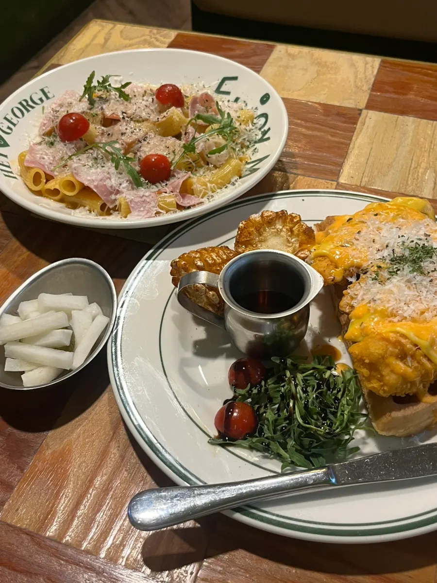 Waffle chicken and pasta set on the table
