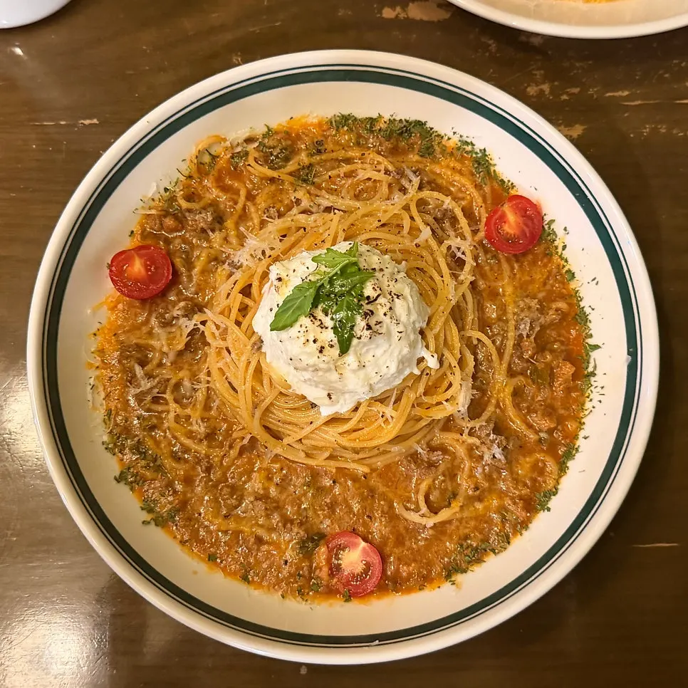 Bocconcini meat chili tomato pasta topped with burrata cheese