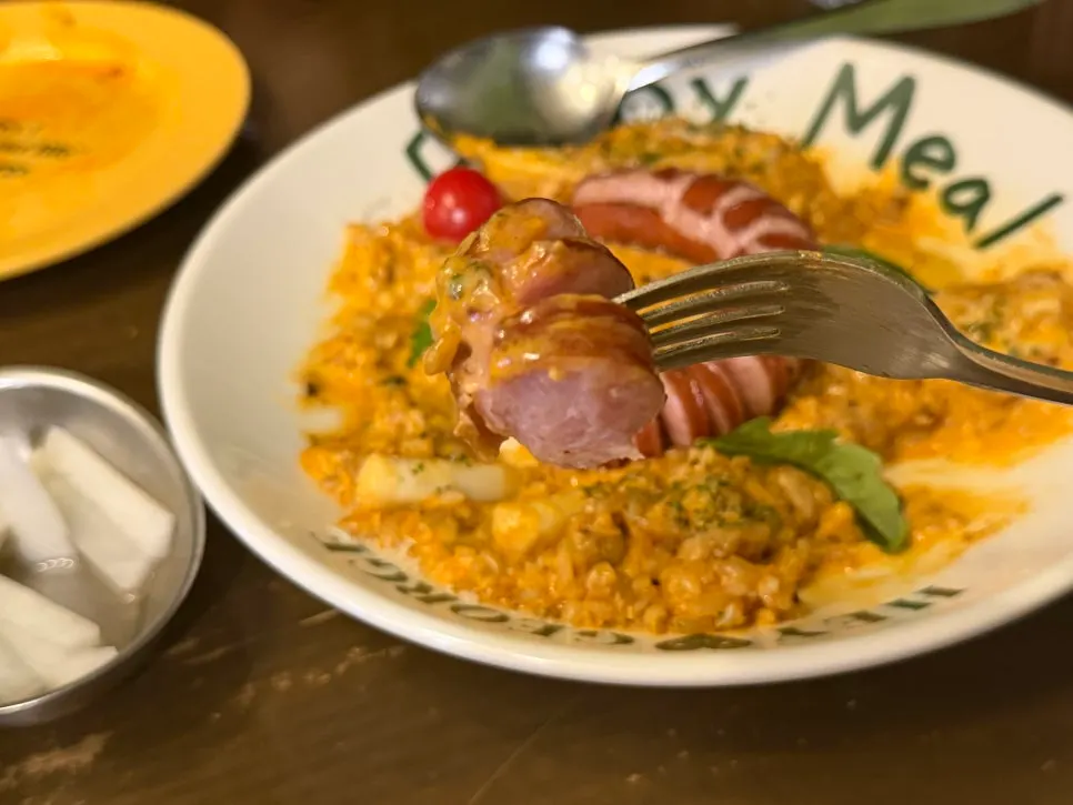 A spoonful of jambalaya rosé risotto rice grains