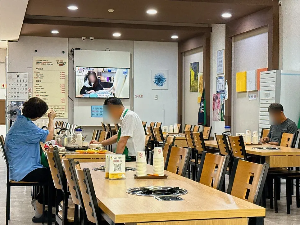 Spacious and clean interior hall of the budae jjigae restaurant