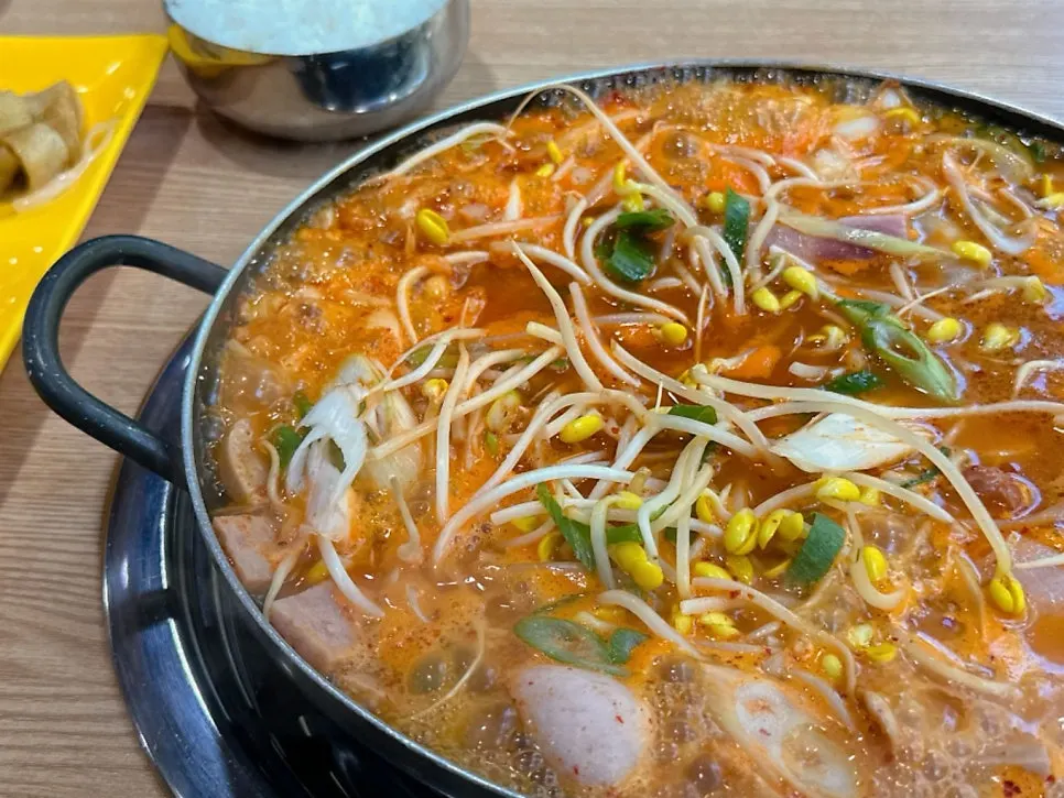 Budae jjigae starting to bubble on the burner