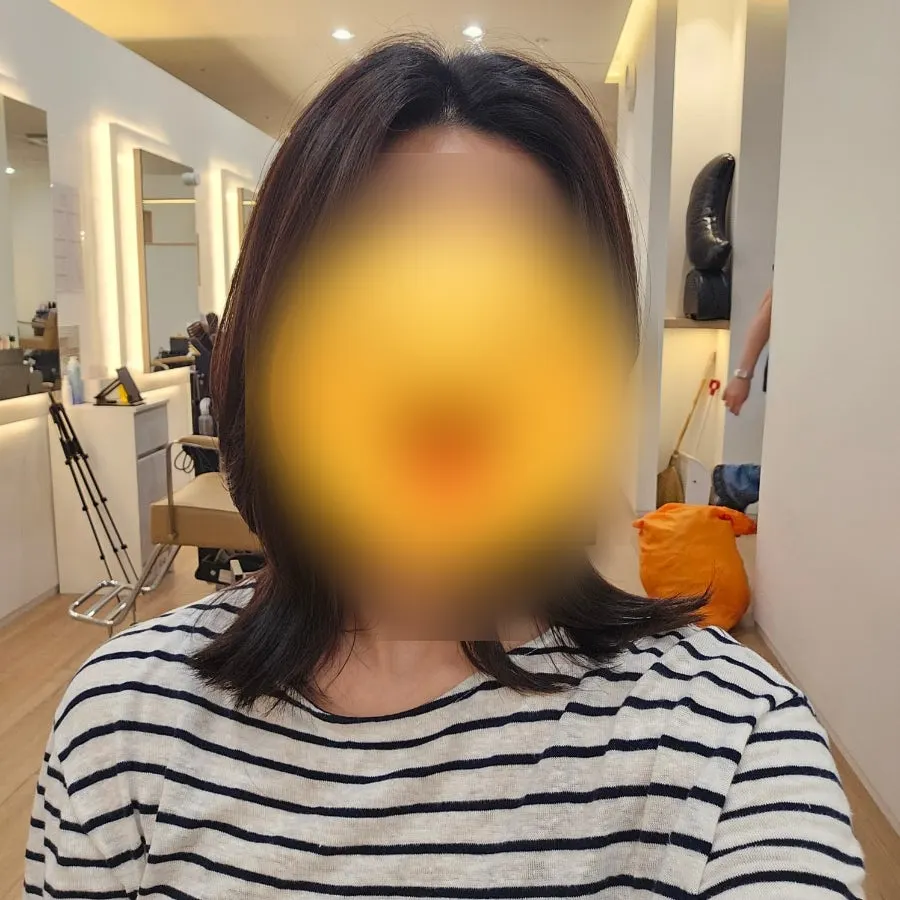 Back view of the finished mid-length design cut