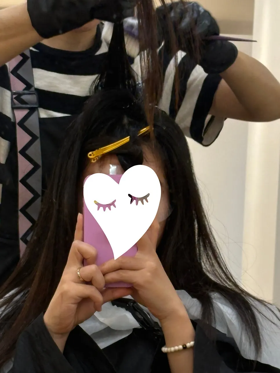 Root magic straightening solution being applied