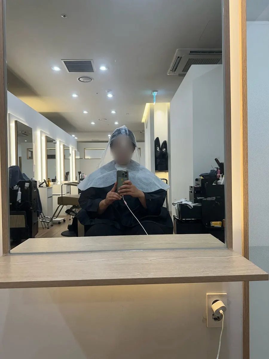 Hair after a cut tailored to volume and growth direction