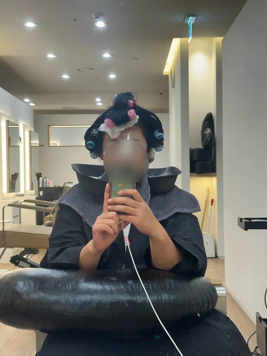 Calm hair texture and side bangs right after the iron