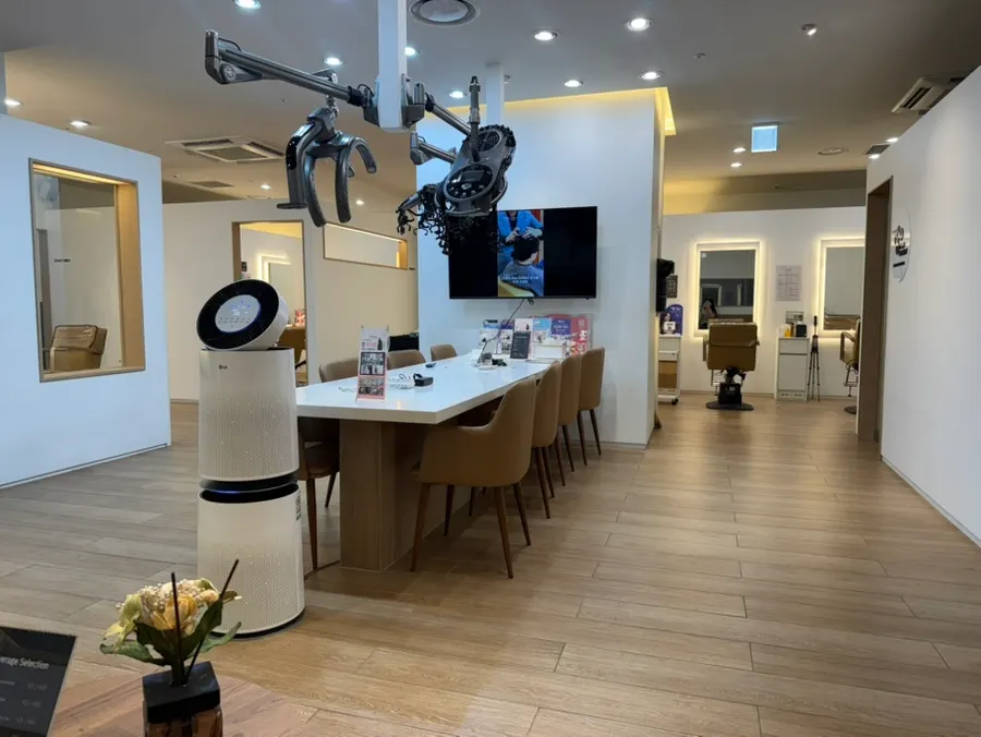Spacious salon waiting area with an air purifier