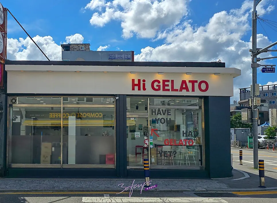 Hi Gelato storefront with white walls and red lettering