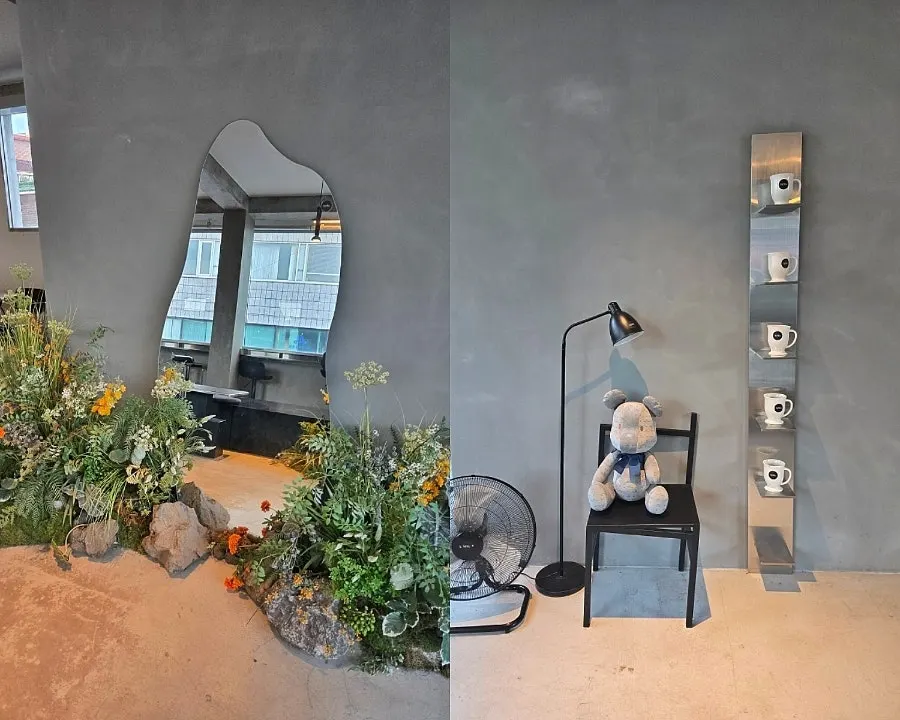 Full-length mirror and displayed cups in the café