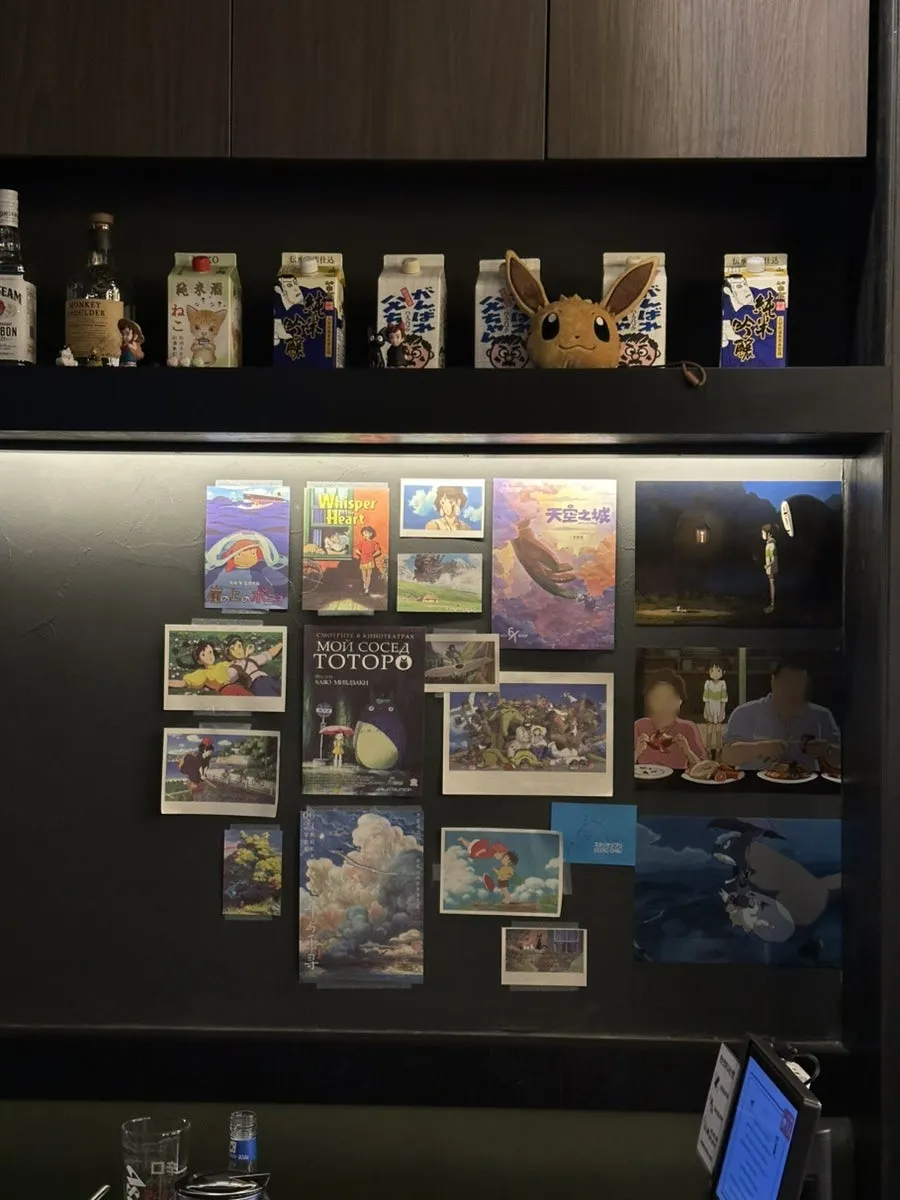 Anime poster decorations inside Hiku