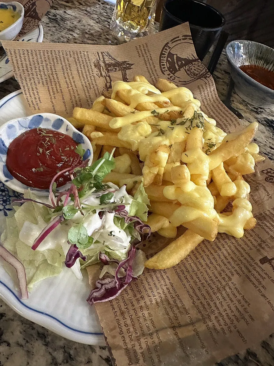 Butter fries served alongside drinks