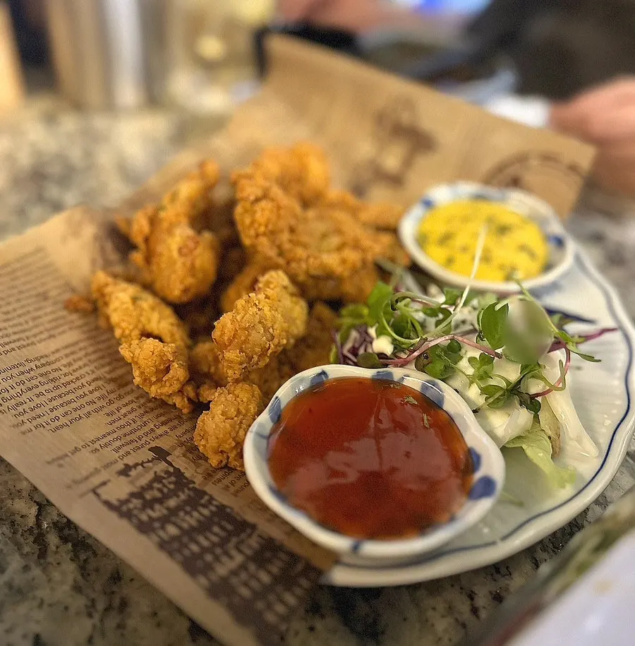 A plate of chicken skin at Hiku